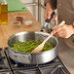 Vollrath Tribute 6 Qt. Tri-Ply Stainless Steel Saute Pan with Black Silicone Handle 702160