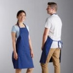 Choice Kelly Green Poly-Cotton Adjustable Bib Apron with 2 Pockets - 32