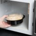 Pactiv Newspring NC718B 16 oz. Black VERSAtainer Round Microwavable Container with Lid - 150/Case