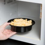 Pactiv Newspring NC718B 16 oz. Black VERSAtainer Round Microwavable Container with Lid - 150/Case