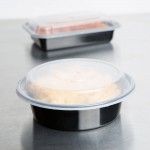 Pactiv Newspring NC718B 16 oz. Black VERSAtainer Round Microwavable Container with Lid - 150/Case
