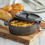 Vollrath 59744 10 oz. Pre-Seasoned Mini Cast Iron Oval Dutch Oven