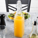 Acopa 35 oz. Customizable Clear Glass Bottle with Wire Bail Swing Top Lid - 12/Case Acopa 35 oz. Customizable Clear Glass Bottle with Wire Bail Swing Top Lid - 12/Case