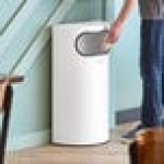 Lancaster Table & Seating 9 Gallon White Powder-Coated Metal Half Round Decorative Trash Can with Side Opening