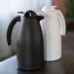 Service Ideas Alpha Carafe 33.8 oz. White Plastic Insulated Coffee Carafe / Server with Push-Button Lid ALPH10WH