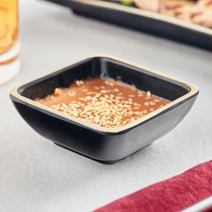Acopa Ugoki 2 oz. Matte Black Square Melamine Sauce Dish with Ivory Rim - 12/Pack Acopa Ugoki 2 oz. Matte Black Square Melamine Sauce Dish with Ivory Rim - 12/Pack