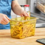 Carlisle 3088213 StorPlus 1/4 Size Amber High Heat Plastic Food Pan - 6