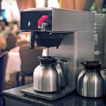Service Ideas Brew 'N' Pour 64.2 oz. Stainless Steel Coffee Carafe / Server with Black Brew-Thru Lid BNP19BL