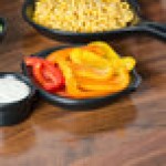Hall China from Steelite International HL5130AFCA Foundry 10 oz. Black China Round Au Gratin Dish - 24/Case