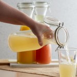 Acopa 33 oz. Customizable Glass Carafe with Resealable Lid - 12/Case