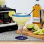 Libbey 92315 Aruba 16 oz. Customizable Margarita Glass with Cobalt Blue Rim and Base - 12/Case