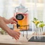 Acopa 1.75 Gallon Glass Beverage Dispenser with Chalkboard Sign and Metal Stand Acopa 1.75 Gallon Glass Beverage Dispenser with Chalkboard Sign and Metal Stand