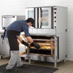 Cooking Performance Group FGC-200-NK Double Deck Standard Depth Full Size Natural Gas Convection Oven with Legs - 108,000 BTU Cooking Performance Group FGC-200-NK Double Deck Standard Depth Full Size Natural Gas Convection Oven with Legs - 108,000 BTU