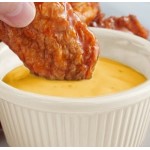 Acopa 3 oz. Bone White Fluted Melamine Ramekin - 12/Case