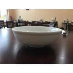 Tuxton BSB-3503 1.01 Qt. Saffron China Menudo / Pasta / Salad Bowl - 12/Case Tuxton BSB-3503 1.01 Qt. Saffron China Menudo / Pasta / Salad Bowl - 12/Case
