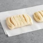 Bridor Ready-to-Bake Curved Vegan Croissant 3.5 oz. - 44/Case