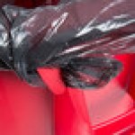 Rubbermaid® BRUTE 55 Gallon Red Round Trash Can with Lid and Dolly
