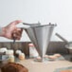 Matfer Bourgeat 258825 2 Qt. (64 oz.) Stainless Steel Confectionery Dispenser Funnel with 3-Piece Nozzle Set Matfer Bourgeat 258825 2 Qt. (64 oz.) Stainless Steel Confectionery Dispenser Funnel with 3-Piece Nozzle Set
