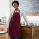 Choice Burgundy Poly-Cotton Adjustable Bib Apron with 2 Pockets and Black Webbing Accents - 32 Choice Burgundy Poly-Cotton Adjustable Bib Apron with 2 Pockets and Black Webbing Accents - 32