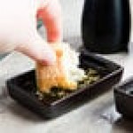 Tuxton GZL-750 TuxTrendz Kona 1.75 oz. Lava China Sauce Dish - 24/Case