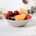 Acopa 3.5 oz. Ivory (American White) Rolled Edge Stoneware Fruit Bowl / Monkey Dish - 36/Case