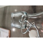 Acopa 19 oz. Customizable Clear Glass Bottle with Wire Bail Swing Top Lid - 12/Case