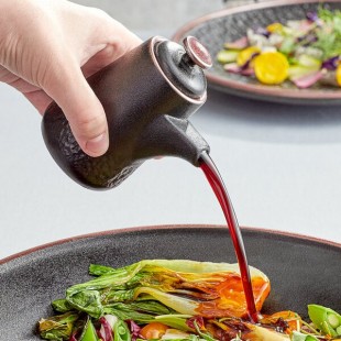 Acopa Heika 3.7 oz. Black Matte Textured Stoneware Soy Sauce Pourer - Sample