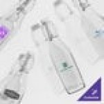 Acopa 8.5 oz. Customizable Clear Glass Bottle with Wire Bail Swing Top Lid - 12/Case