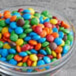 M&M's® Milk Chocolate Mini Bits Topping - 25 lb. M&M's® Milk Chocolate Mini Bits Topping - 25 lb.