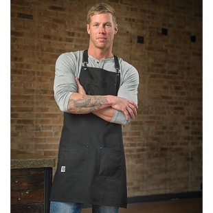 Mercer Culinary M63208BDBK Metro Edge Renegade Black Cotton Canvas Bib Apron with Adjustable Black Leather Cross-Back Straps, and 5 Pockets - 30 1/2