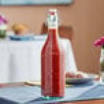 Arcoroc FJ016 25.25 oz. Swing Top Tinted Green Glass Bottle by Arc Cardinal - 6/Case