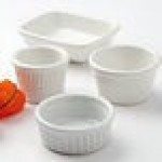 Tuxton BWZ-040B Healthcare 4 oz. Bright White Rectangle China Sauce Dish - 24/Case
