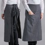 Choice Black and White Chalk Stripe Poly-Cotton Front of House Bib Apron with 3 Pockets - 25 Choice Black and White Chalk Stripe Poly-Cotton Front of House Bib Apron with 3 Pockets - 25