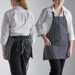 Choice Black and White Chalk Stripe Poly-Cotton Front of House Bib Apron with 3 Pockets - 25 Choice Black and White Chalk Stripe Poly-Cotton Front of House Bib Apron with 3 Pockets - 25