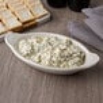 Hall China from Steelite International HL5280AWHA Ivory (American White) 12 oz. Oval Rarebit / Au Gratin Dish - 24/Case