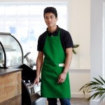 Choice Kelly Green Poly-Cotton Standard Bib Apron with 2 Pockets - 34
