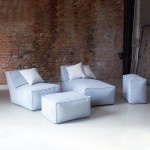 Modular sofa with inclined back