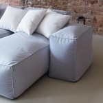 Modular sofa with inclined back