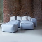 Modular sofa with inclined back