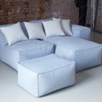 Modular sofa with inclined back