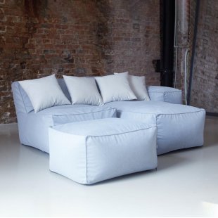 Modular sofa with inclined back
