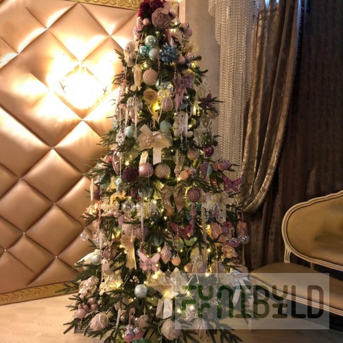 Designer Christmas tree decorated with Premium Pink Gold