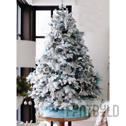 Designer spruce decorated with Snow