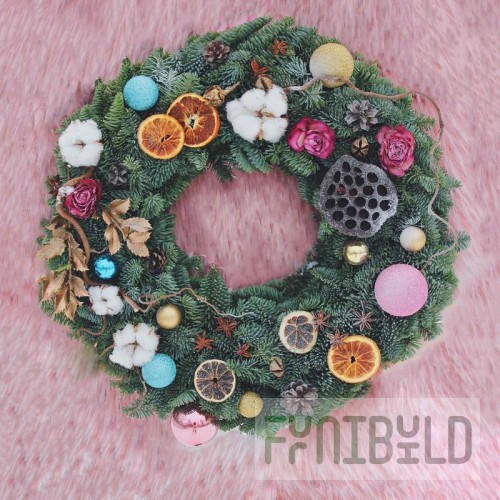 Decorative wreath made of spruce branches Santa