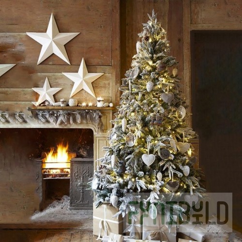 Designer spruce decorated with Christmas Star