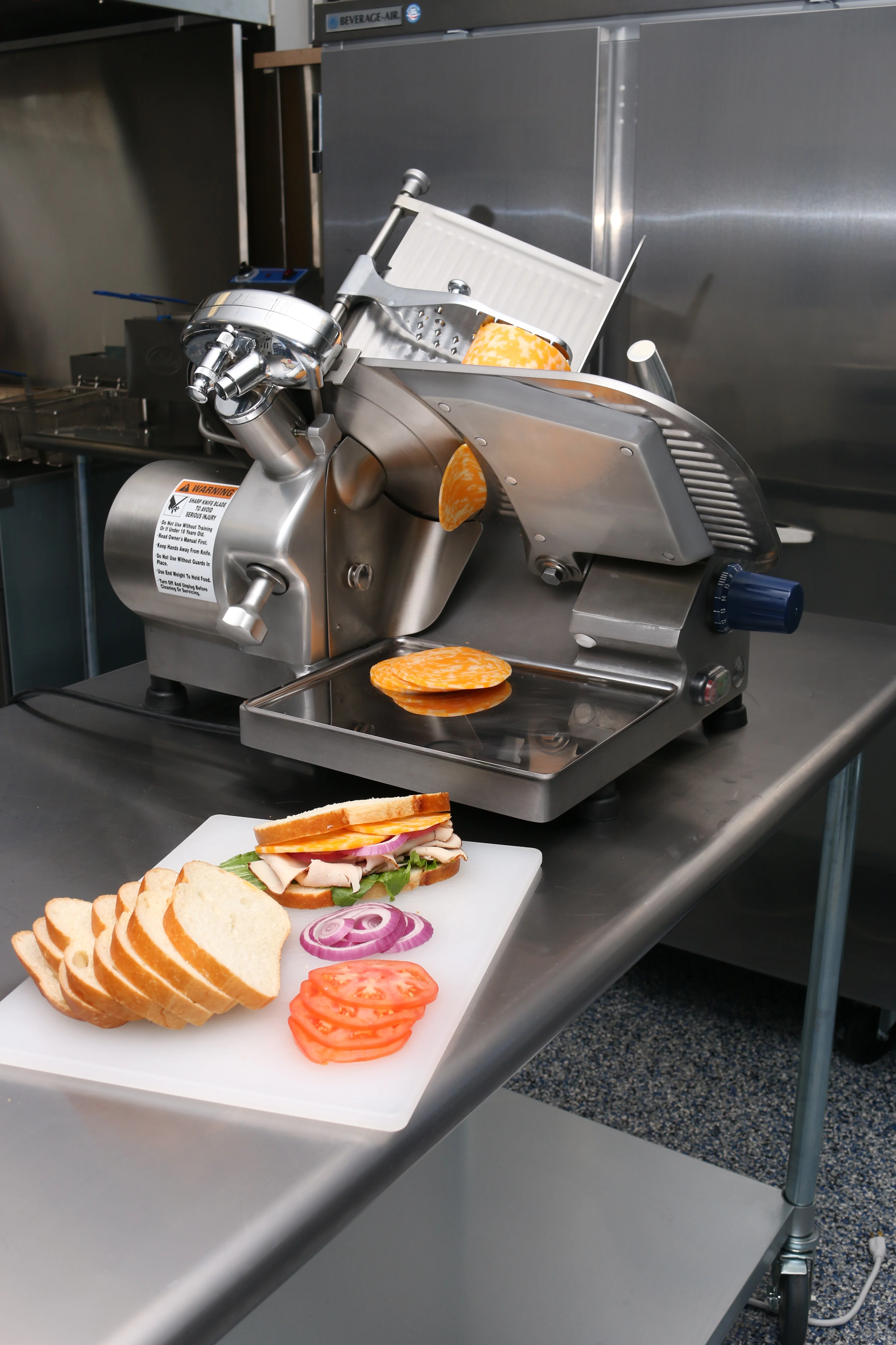 Globe GC512 12 Inch Diameter Electric Food Slicer Stainless Steel and Aluminum with Top Mounted Removable Sharpener Globe GC512 12 Inch Diameter Electric Food Slicer Stainless Steel and Aluminum with Top Mounted Removable Sharpener
