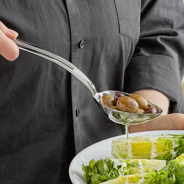 Vollrath 46727 Miramar® 2 oz. Stainless Steel Open Handle Slotted Oval Serving Spoon