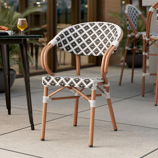 Lancaster Table & Seating Bistro Black and White Birdseye Weave Rattan Outdoor Arm Chair Lancaster Table & Seating Bistro Black and White Birdseye Weave Rattan Outdoor Arm Chair