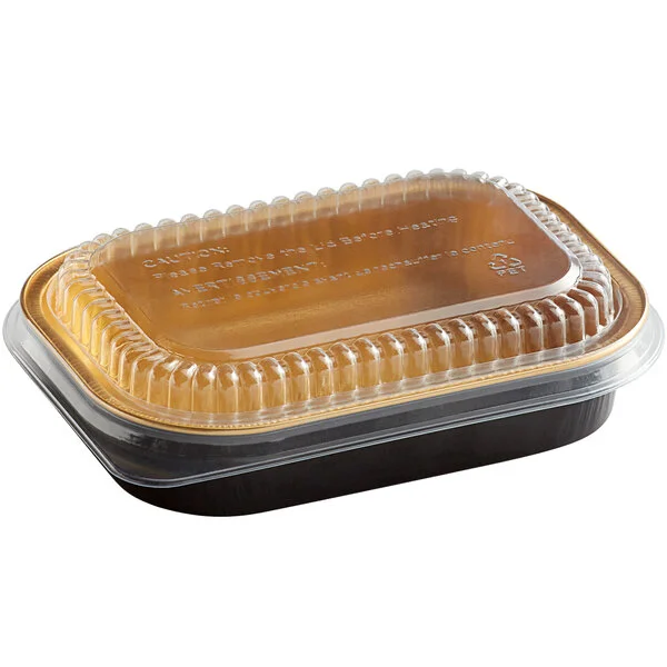 Choice Heavy Duty Smoothwall Black and Gold Mini Oblong Foil Take-Out Pan with Dome Lid 16 oz. - 100/Case Choice Heavy Duty Smoothwall Black and Gold Mini Oblong Foil Take-Out Pan with Dome Lid 16 oz. - 100/Case