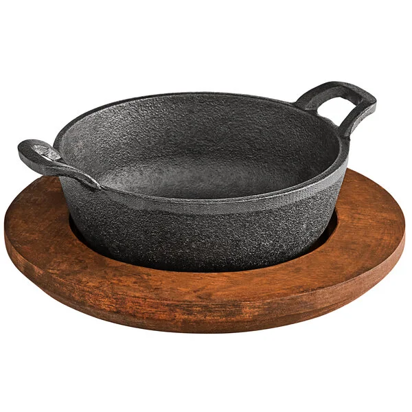 Valor 12 oz. Pre-Seasoned Mini Cast Iron Round Serving Bowl with Rustic Chestnut Finish Rubberwood Underliner Valor 12 oz. Pre-Seasoned Mini Cast Iron Round Serving Bowl with Rustic Chestnut Finish Rubberwood Underliner
